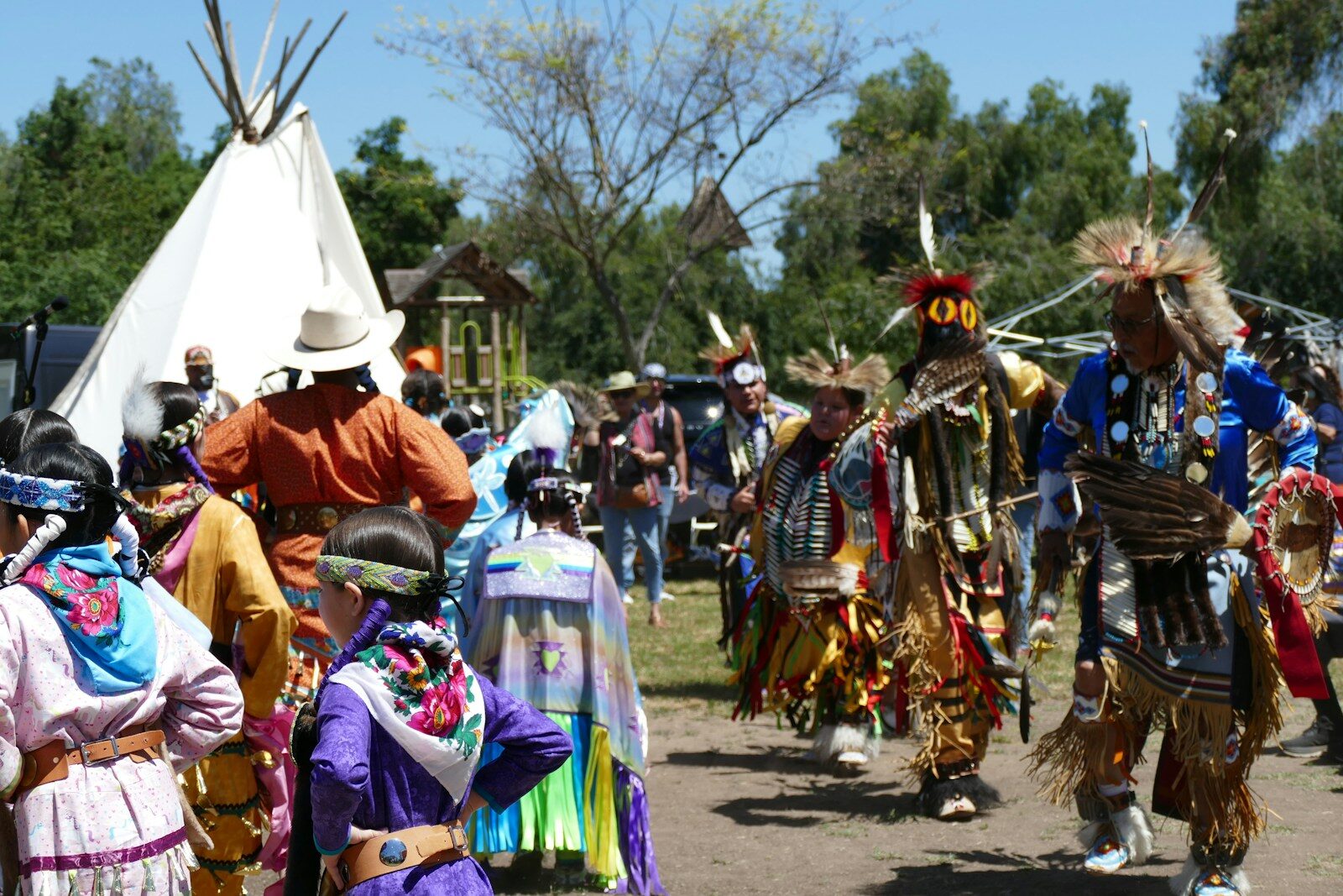 Indigenous people celebrate with a colorful gathering